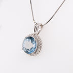14k Blue Topaz Pendant