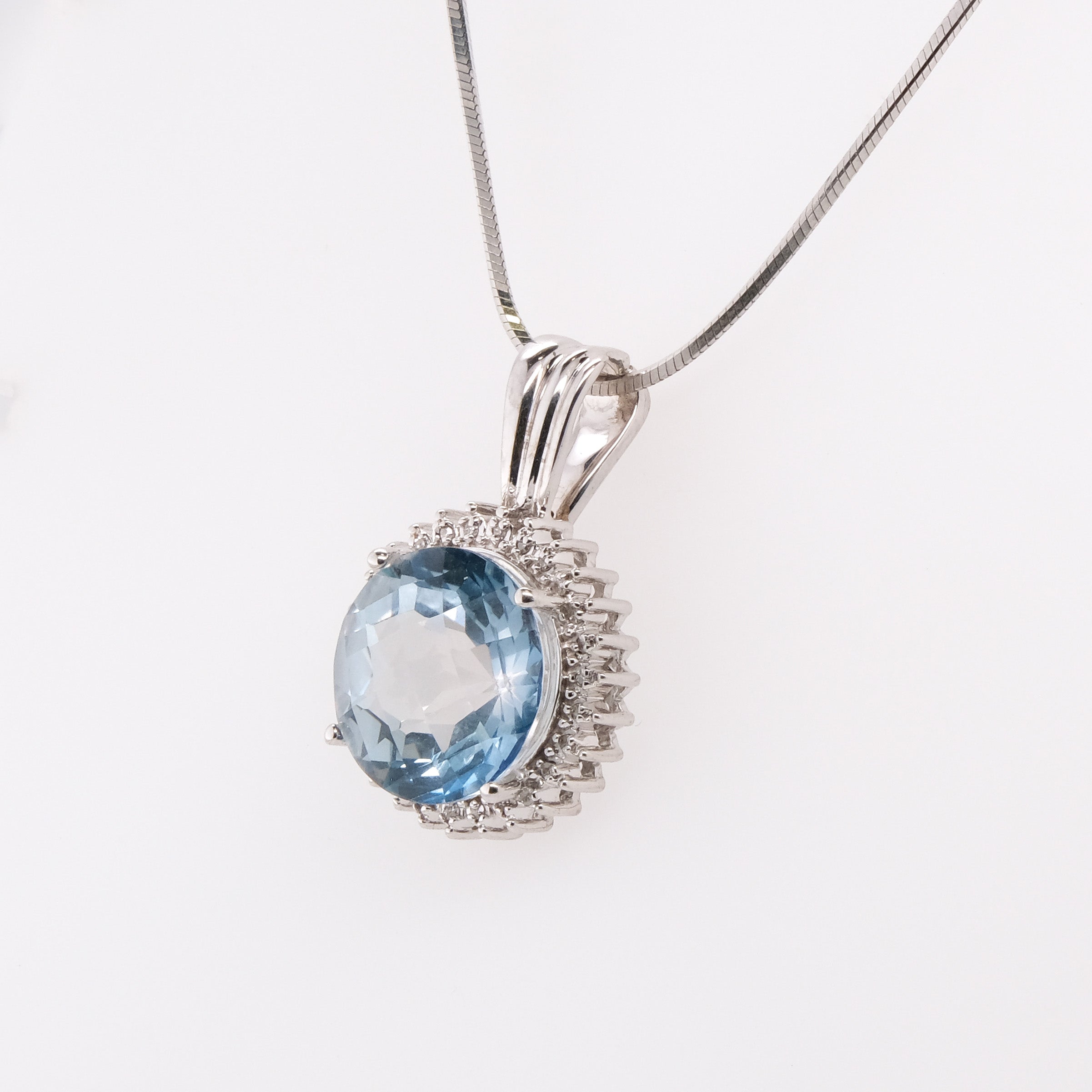 14k Blue Topaz Pendant