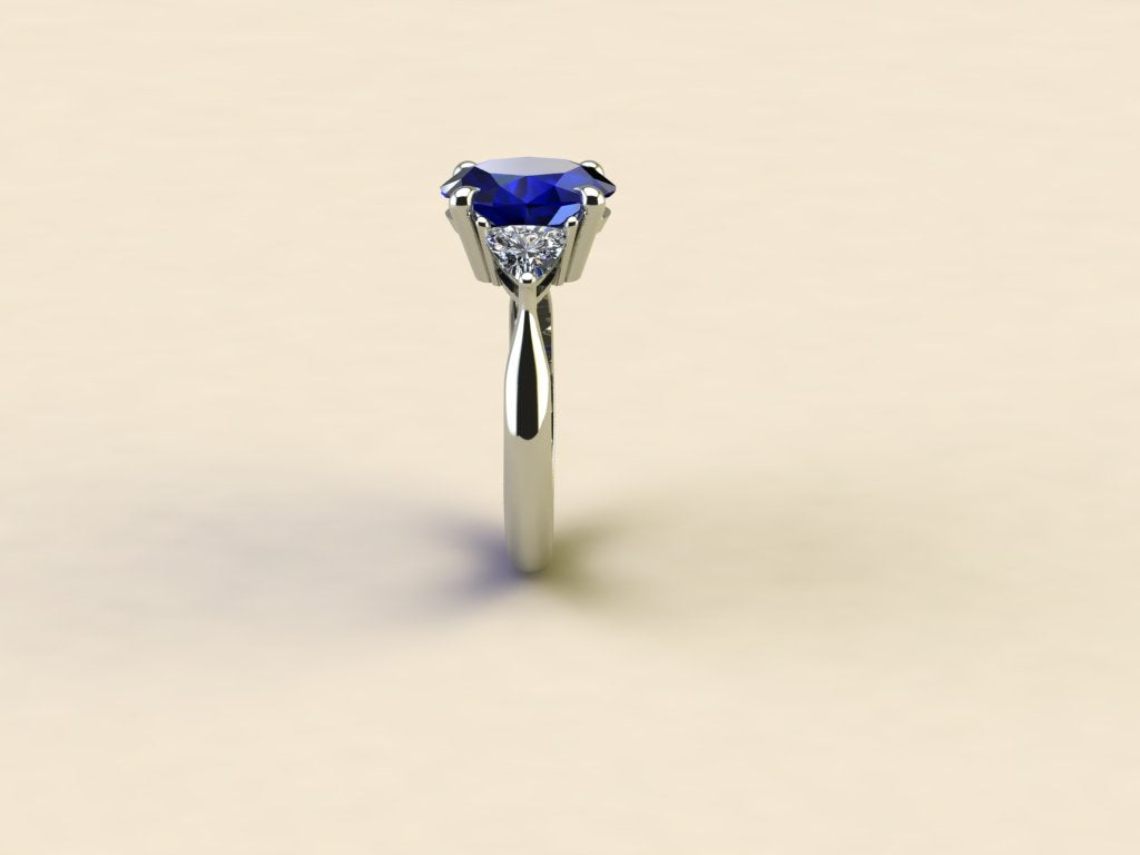 Sapphire with Triangular Diamond Side Stones