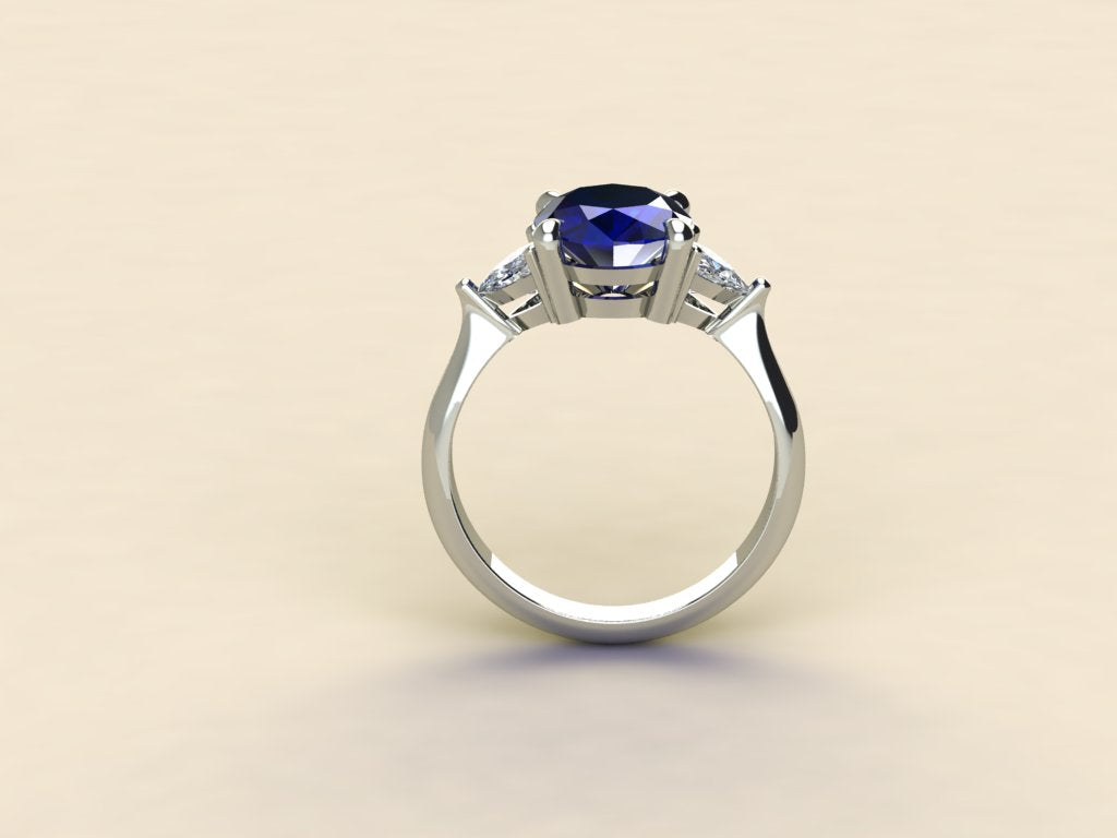 Sapphire with Triangular Diamond Side Stones